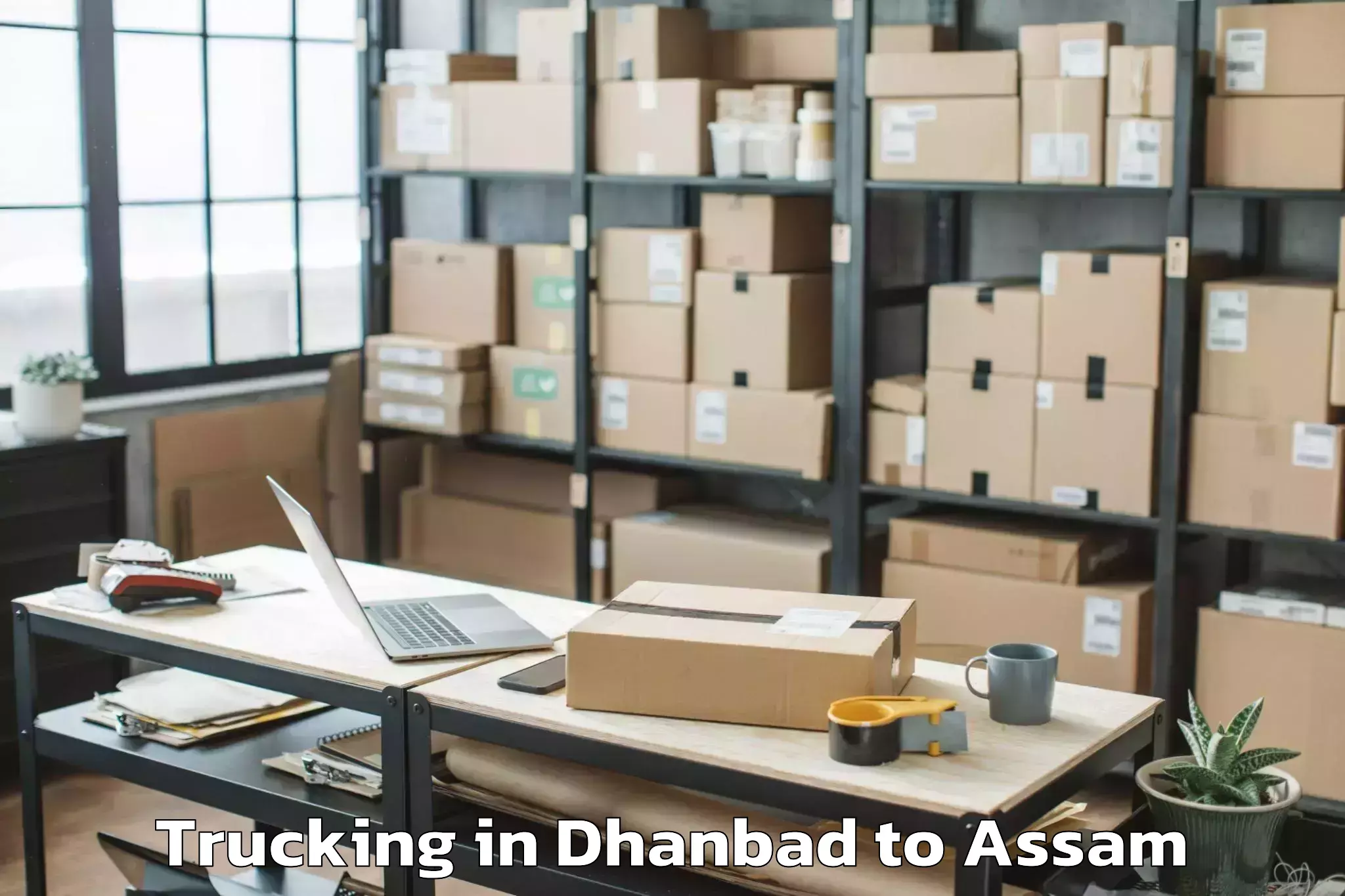 Leading Dhanbad to Sonapur Trucking Provider